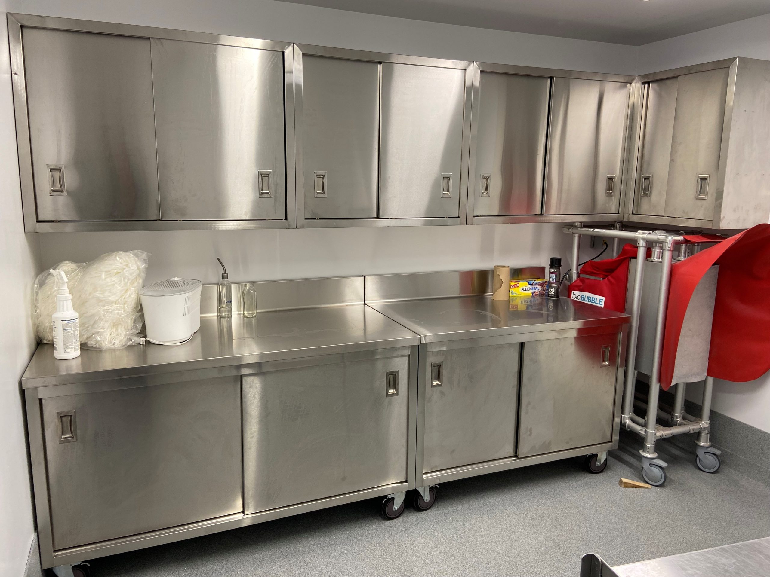 stainless steel cabinets with wall mounted cabinets over top