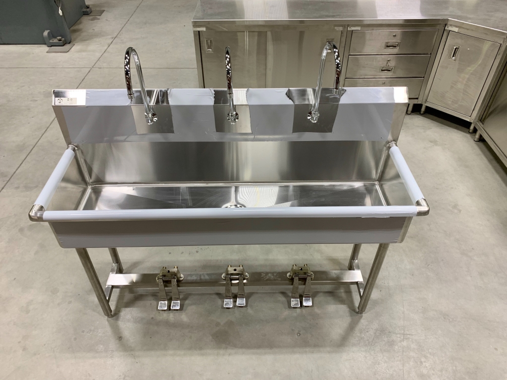 Trough Sinks with Legs and Three Faucets Operated with Foot Pedals